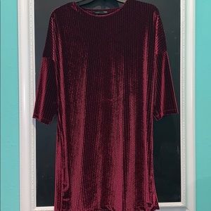 Maroon velvet dress.